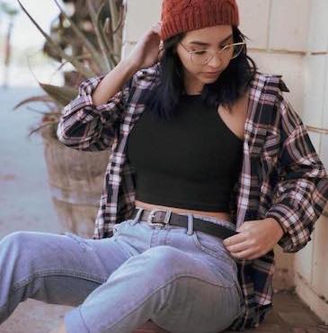 Woman wearing jeans, plaid shirt and beanie from Fashion Q