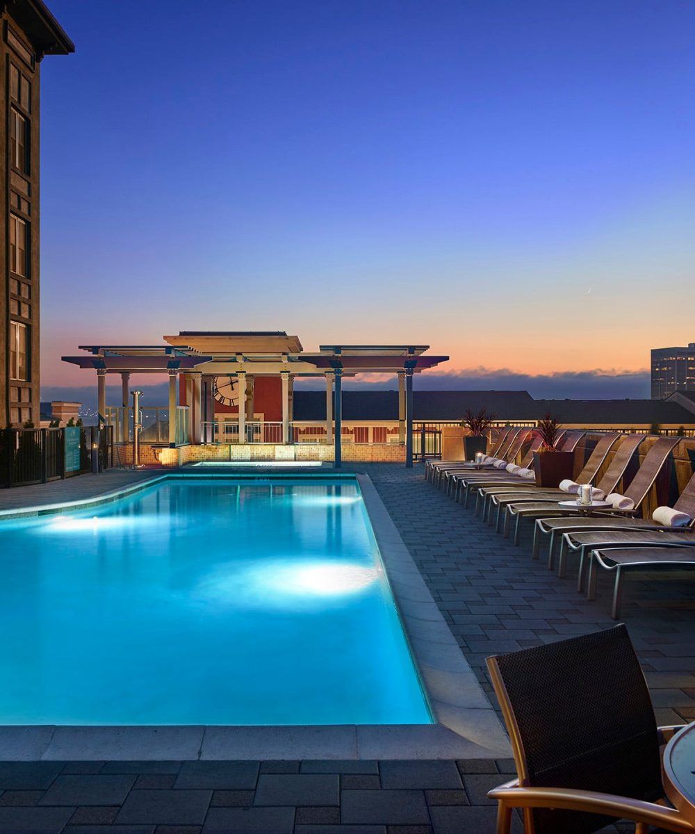 AVE luxury apartments pool at night